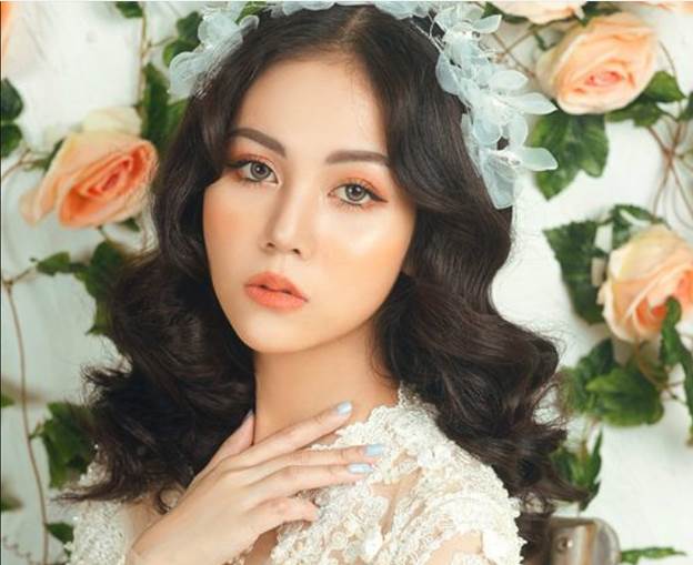 Trang điểm cô dâu ngày cưới với tone cam